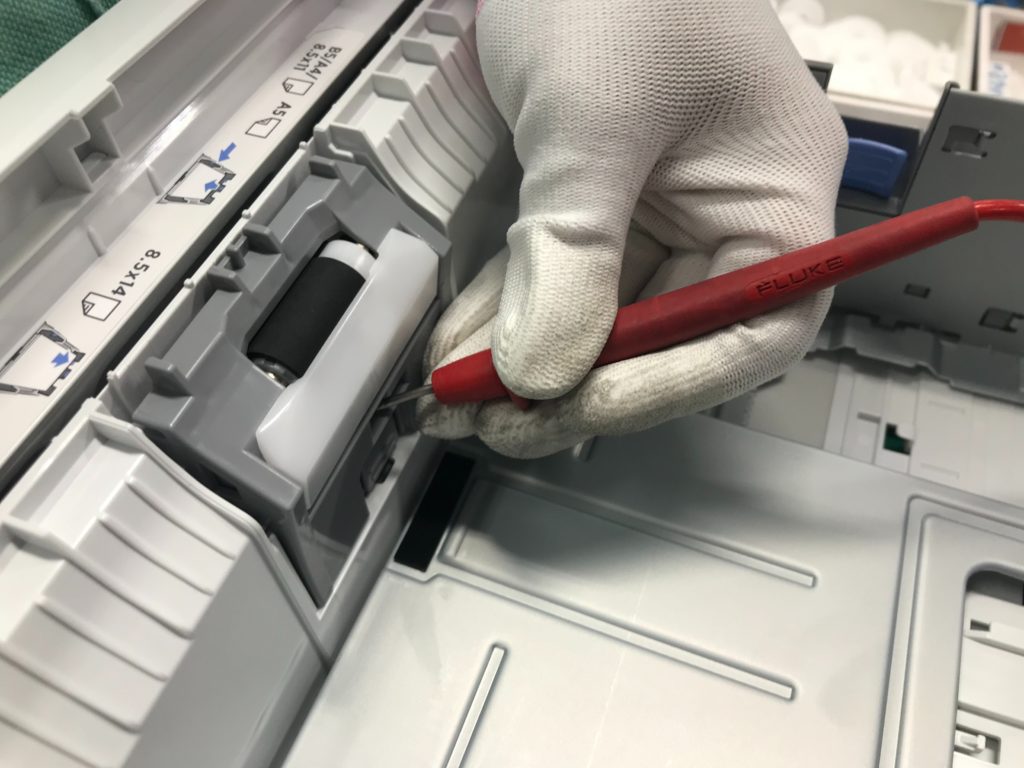 main gantée-diagnostic imprimante